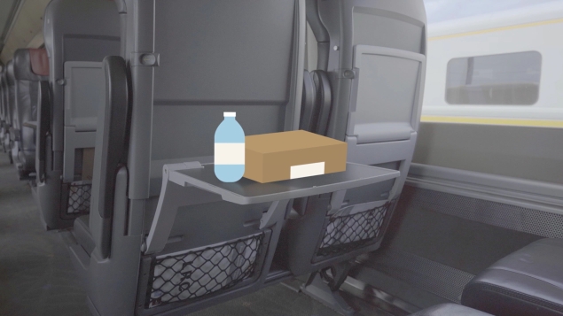 Water bottle and lunch box on seat tray